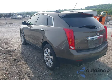 2016 Cadillac Srx Premium Collection z USA, uszkodzony, nr VIN 3GYFNDE3XGS526820